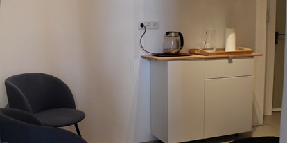 Coworking Spaces - Typ: Bürogemeinschaft - Wien-Stadt - Seminarraum Teeküche - CoSpace Kinderraum