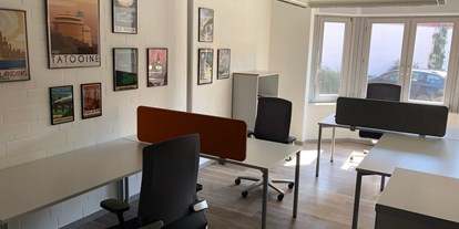 Coworking Spaces - Typ: Shared Office - Lüneburger Heide - Im Open Space "Travel" erscheinen weit entfernte Ziele etwas näher.  - DSTATION KreativCampus