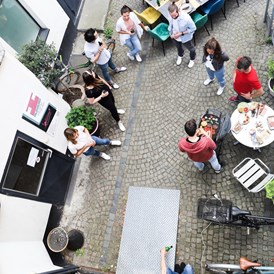 Coworking Space: CoWoRking by CWR
BBQ im Innenhof - CoWoRking by CWR