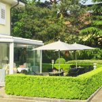 Coworking Space: Außenansicht Wintergarten und Terasse - Ermatingerhof Business Park