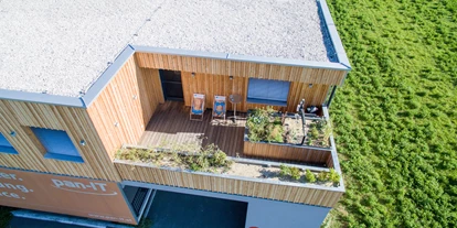 Coworking Spaces - Zugang 24/7 - Österreich - Sonnenterrasse des Sonnenland Teamspace von oben  - Sonnenland Teamspace